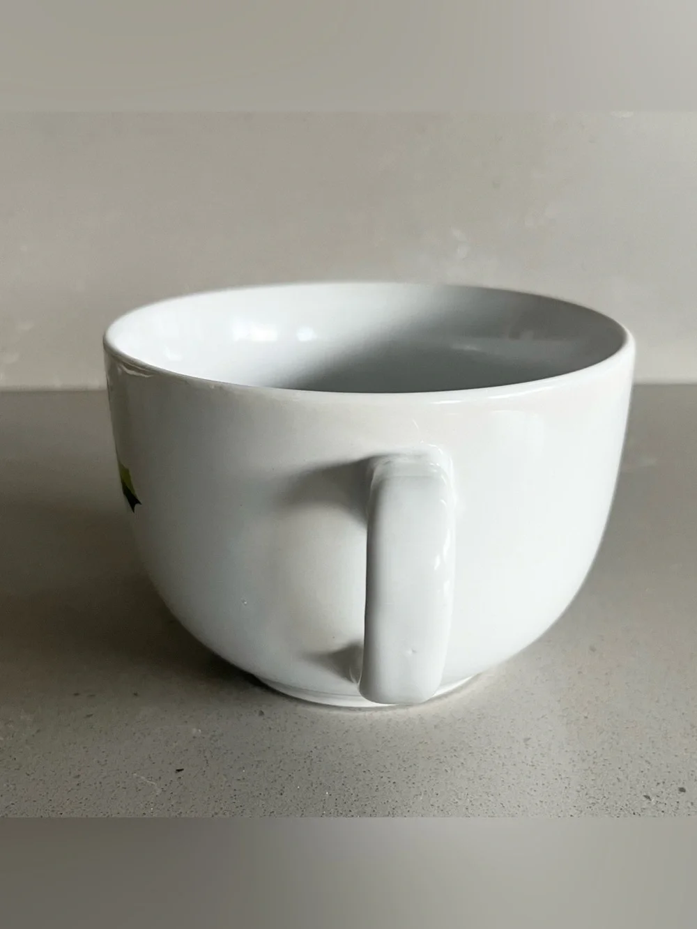 Starbucks holiday mug is in excellent condition. White oversized mug reads STARB
